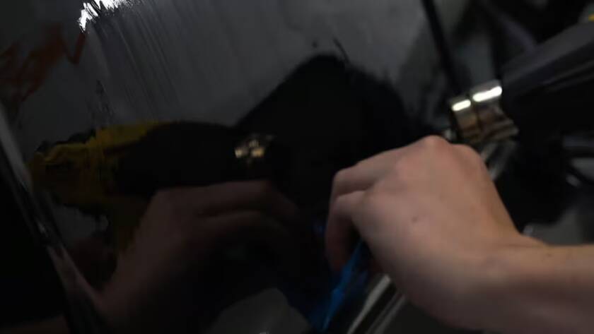 Pre-Shrinking Tint to fit a window receiving a new Tint Install by Wittmann Detailing in Springfield Missouri